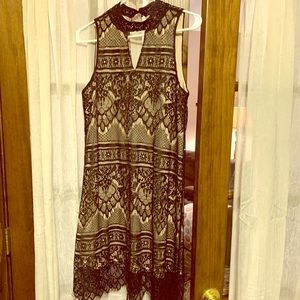 Black and beige lace sleeveless dress